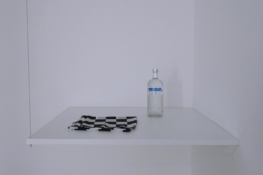Sean Snyder Duty-Free Molotov Cocktail, 2015-2016 Scarf and vodka on 101 cm x 101 cm x 3 cm PVC support, RAL 9010, supended at height of 120 cm 