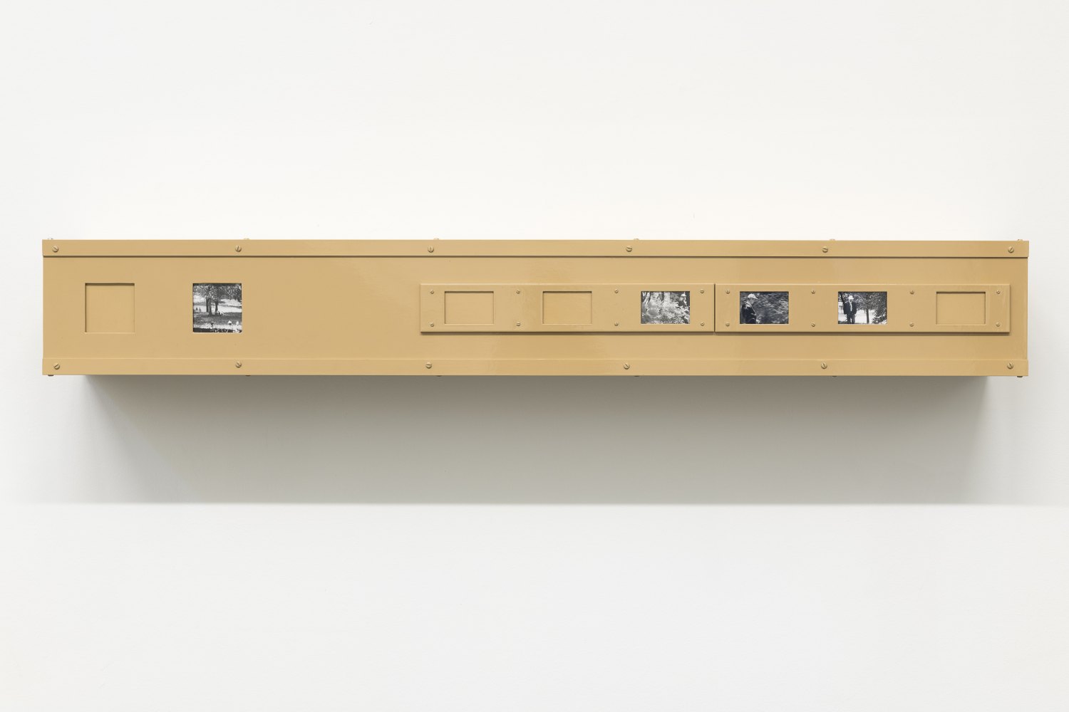 Tom Burr Prospect Park: a documentary in four parts (part two), 1989 Enamel, wood, steel, aluminium, photographic inserts, 20  x 152 x 24 cm