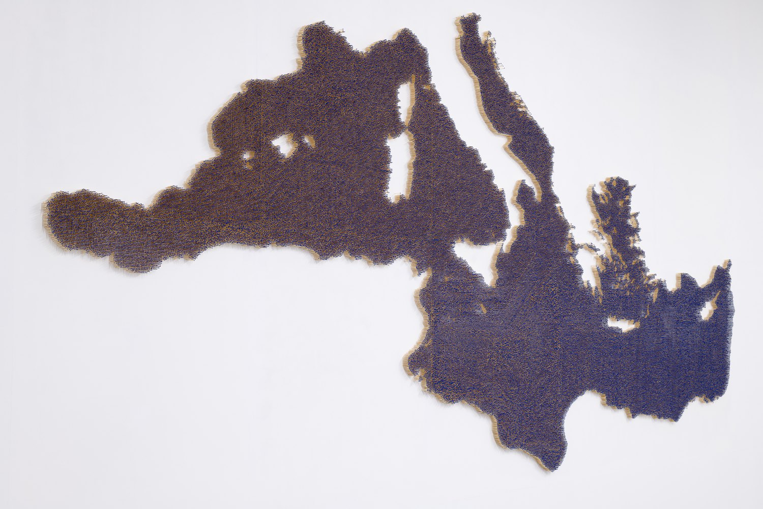 Claire Fontaine  Mediterranean Sea (Unburnt/ Burnt), 2023 Burnt/unburnt matchsticks, dimensions variable 288 x 600 cm, dimensions variable