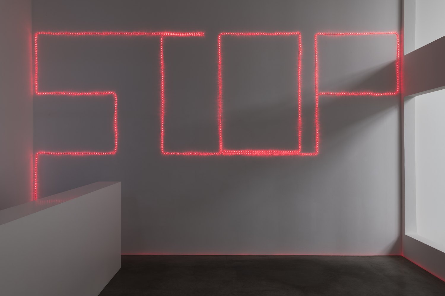 Claire Fontaine STOP, 2023 Red rope lighting, clips, cable ties and cabling 200 x 600 cm up to 400 x 1200 cm 