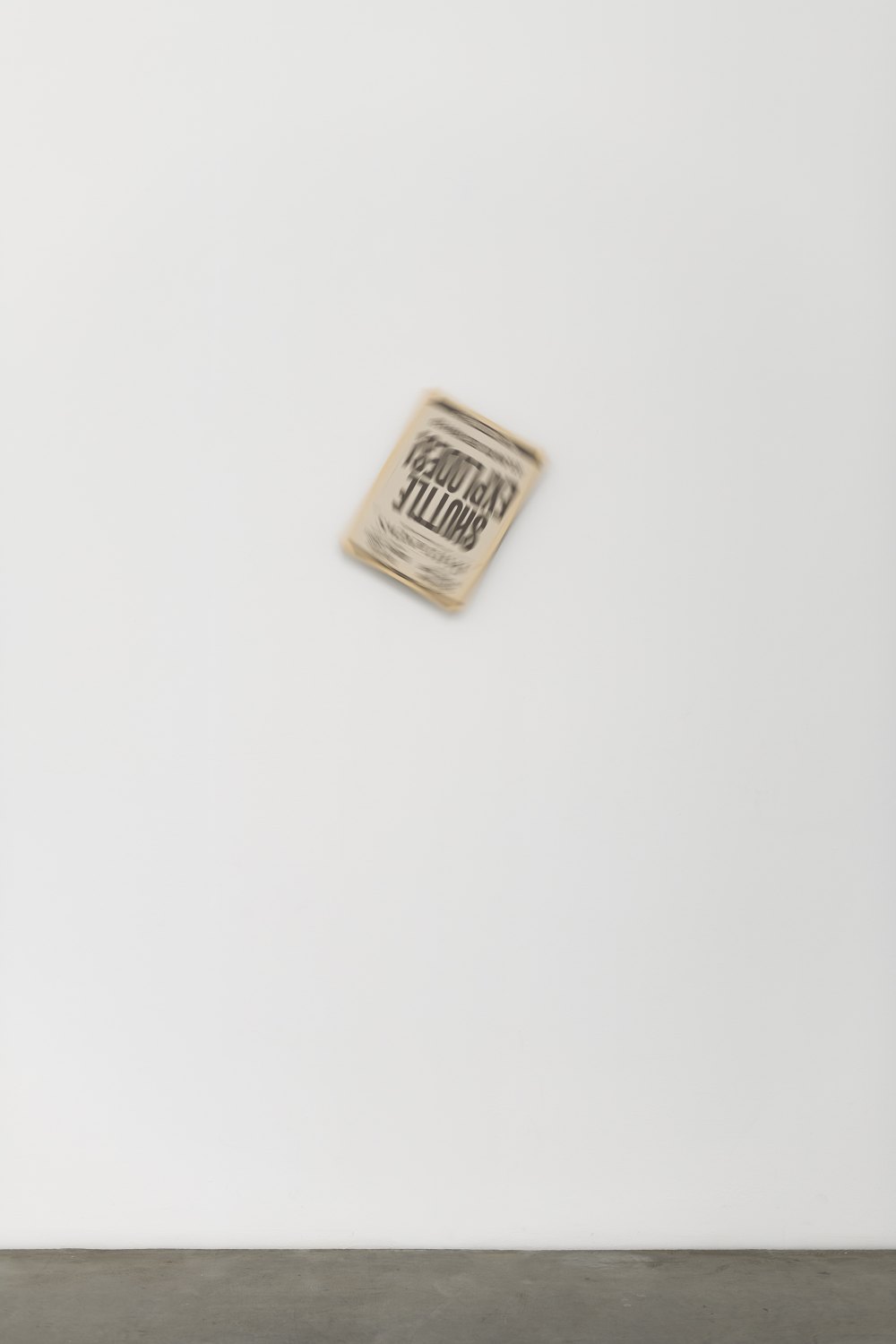 Atiéna R. Kilfa Tablooid, 2025 Newspaper film prop, aluminium, motor  37.5 x 28 cm