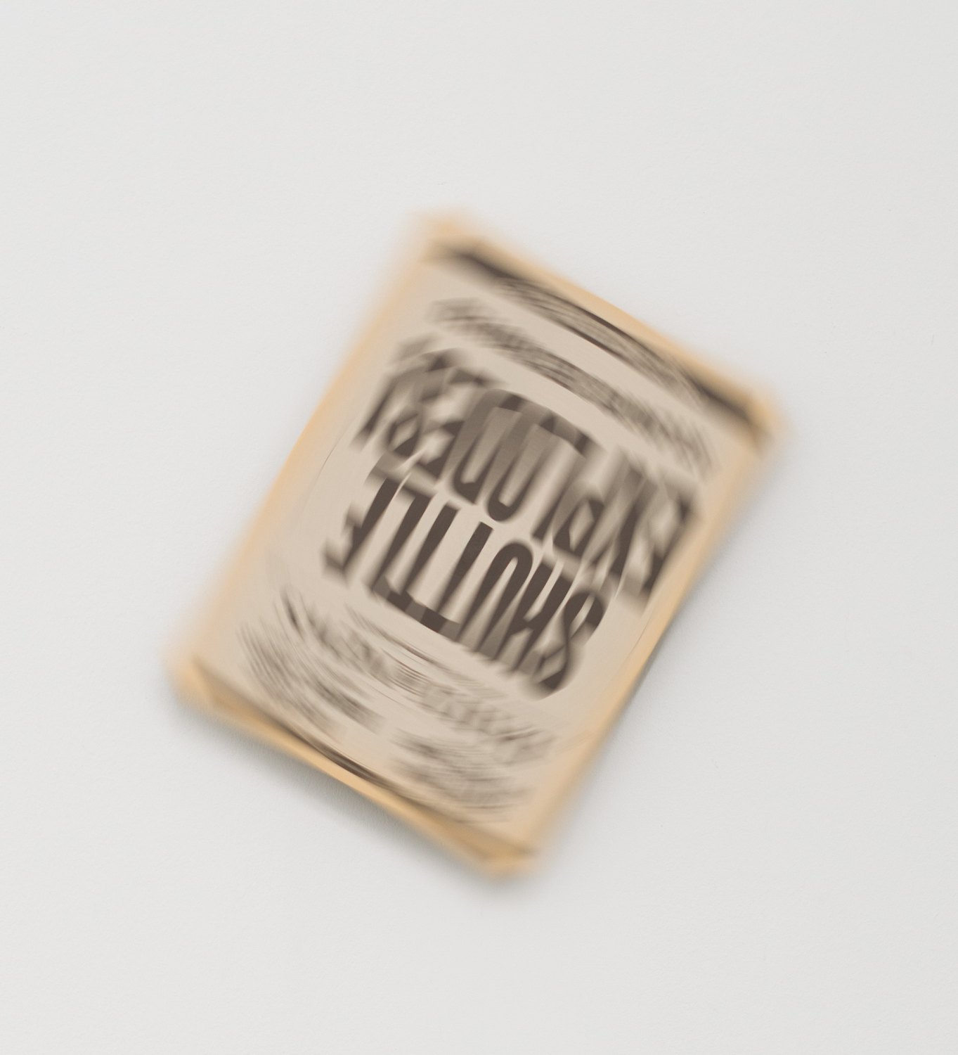 Atiéna R. Kilfa Tablooid, 2025 Newspaper film prop, aluminium, motor  37.5 x 28 cm