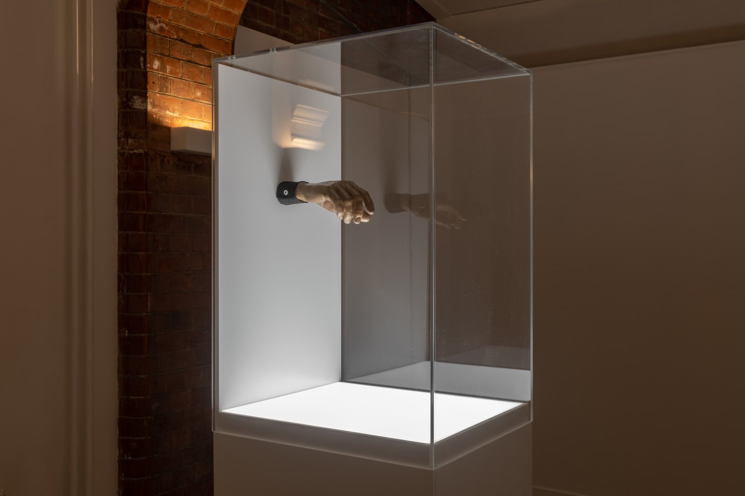 Atiéna R. Kilfa 70.E1, 2023 Rotten expoxy hand, silk cuff, resin plug, led light, wood, plexiglass  175 x 51 x 45 cm