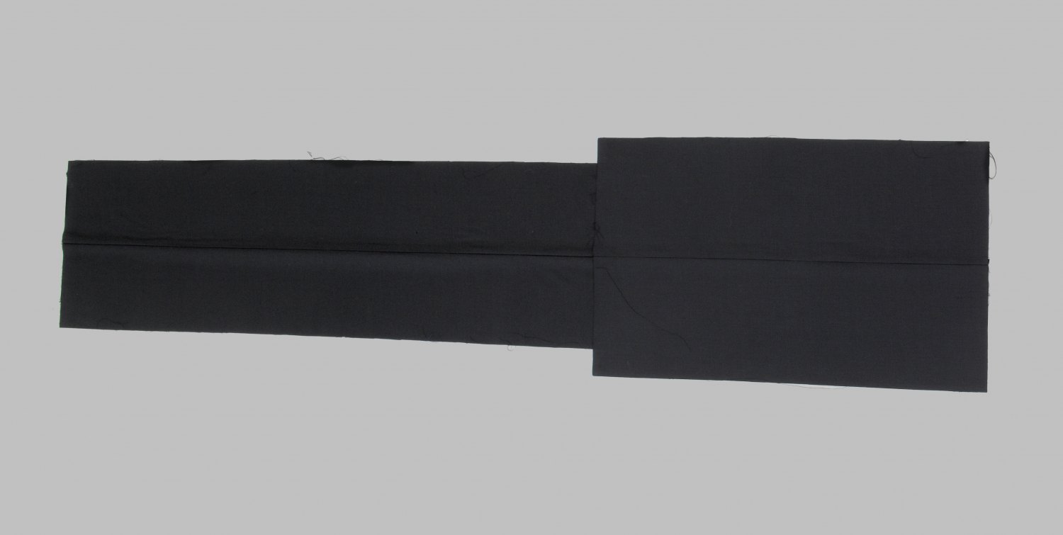 Kitty Kraus Untitled, 2007 Suiting fabric (black, two parts, two centered seams), 43 × 70 cm and 34 × 113 cm
